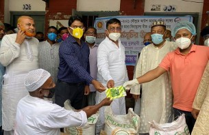তজুমদ্দিনে কৃষকের মাঝে বীজ ও সার বিতরণ