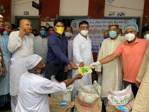 তজুমদ্দিনে কৃষকের মাঝে বীজ ও সার বিতরণ