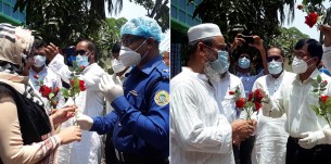 ভোলায় করোনা যুদ্ধে জয়ী বাবা মেয়েকে ফুল দিয়ে বরণ
