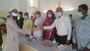 মনপুরায় প্রধানমন্ত্রীর অনুদানের টাকা পেলেন ইমাম-মুয়াজ্জিনরা