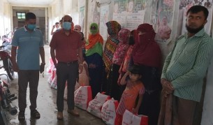 মনপুরায় প্রধানমন্ত্রীর উপহার শিশু খাদ্য বিতরণ