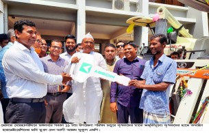 বোরহানউদ্দিনে কৃষকের  মাঝে সারসহ কম্বাইন  হারভেষ্টার মেশিন  বিতরণ