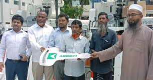 ভোলায় কৃষকের মাঝে ২টি কম্বাইন্ড হারভেষ্টার বিতরণ