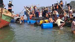 ভোলার মেঘনায় ডুবে যাওয়া মালামালবাহী ট্রলার উদ্ধার