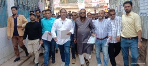 তজুমদ্দিন ও লালমোহনে ধানের র্শীষ  প্রতীকের লিফলেট বিতরণ পথসভা