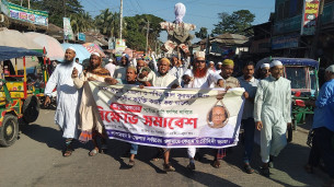 বাউল শিল্পী আবুল সরকারের ফাঁসির দাবিতে লালমোহনে বিক্ষোভ