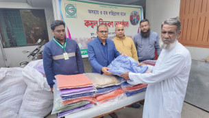 ভোলায় দরিদ্রদের মাঝে শীতবস্ত্র বিতরণ করেছে জিজেইউএস